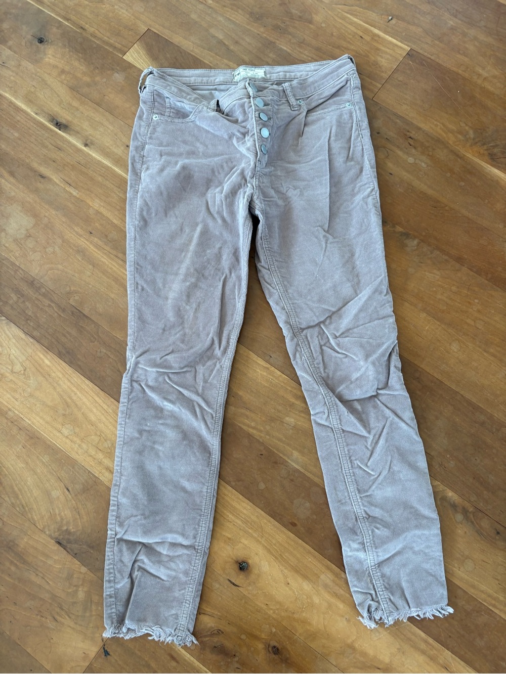 Women’s Slim Corduroy Jeans in Light Taupe with frayed cuffs by Free People